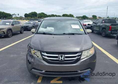 2014 Honda Odyssey Ex-L z USA, uszkodzony, nr VIN 5FNRL5H65EB003909